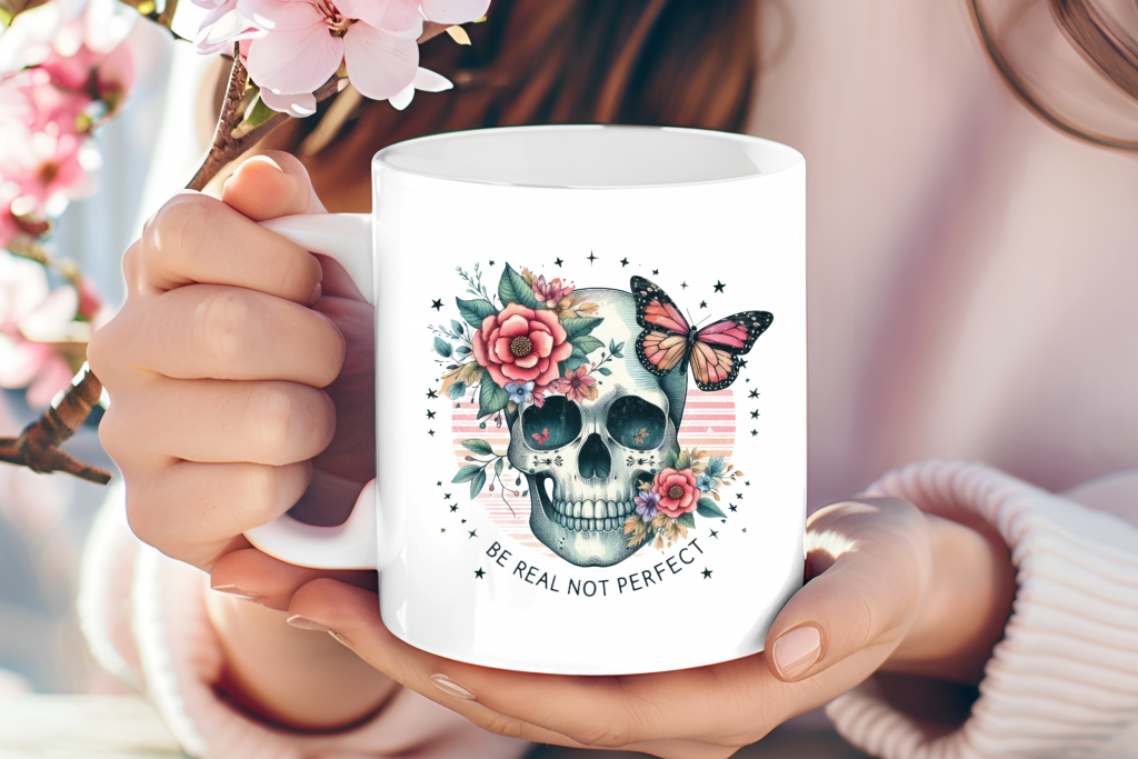 "Be Real Not Perfect" floral skull mug