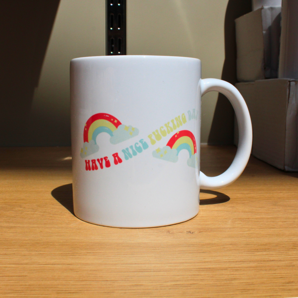 Rainbow Rage Mug — Cheerful Chaos Ceramic Cup