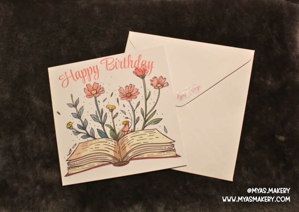 Floral Book Birthday Card — Whimsical Open Book Illustration with Blooming Flowers