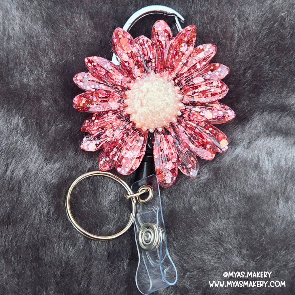 Blaze burst floral badge reel