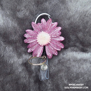 Diva dust floral badge reel