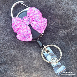 Cotton Candy Chaos Bow Badge Reel