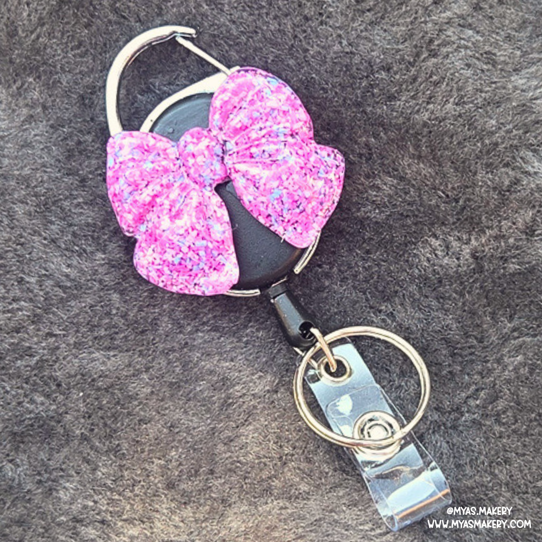 Cotton Candy Chaos Bow Badge Reel - Image 5