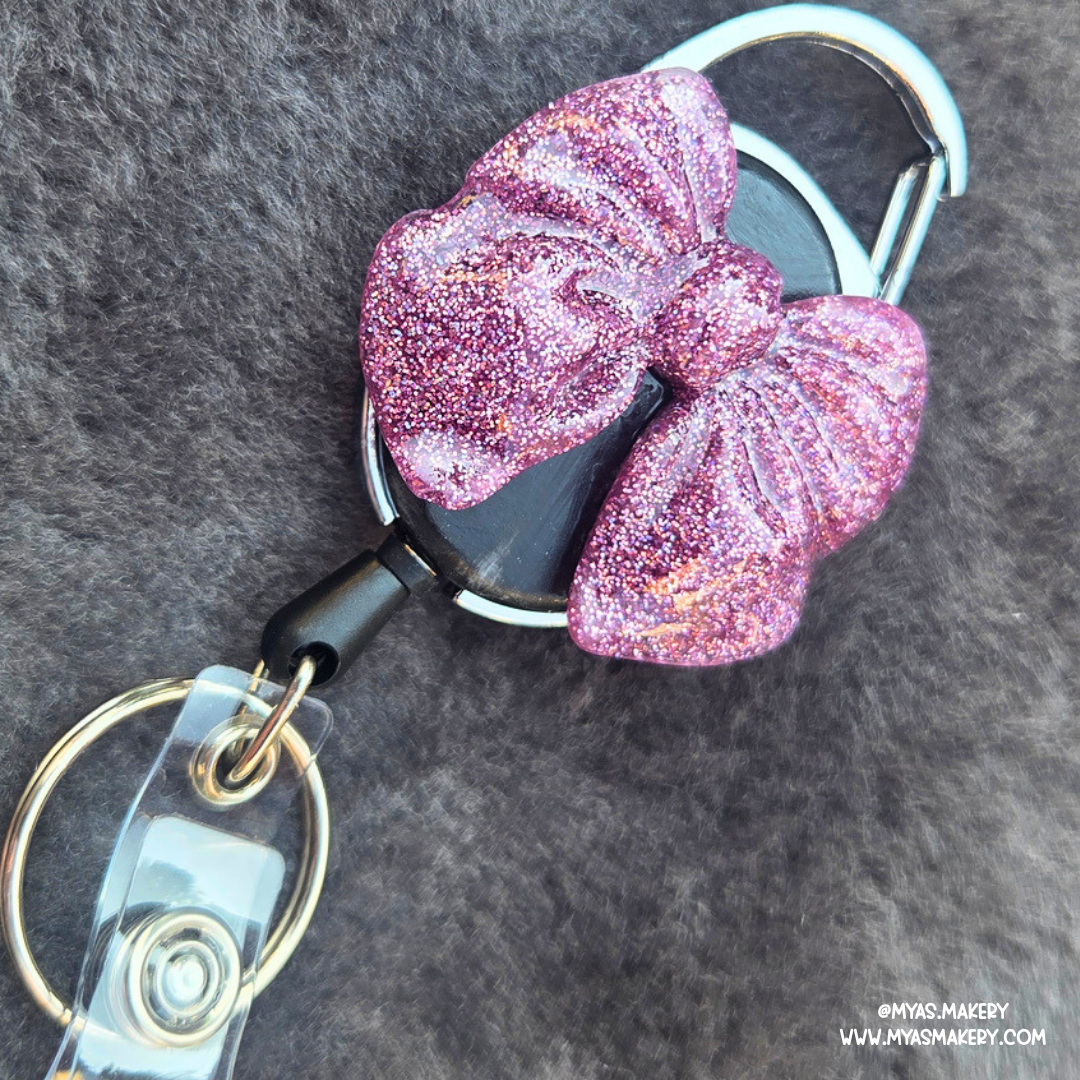 Diva Dust Bow badge reel - Image 2